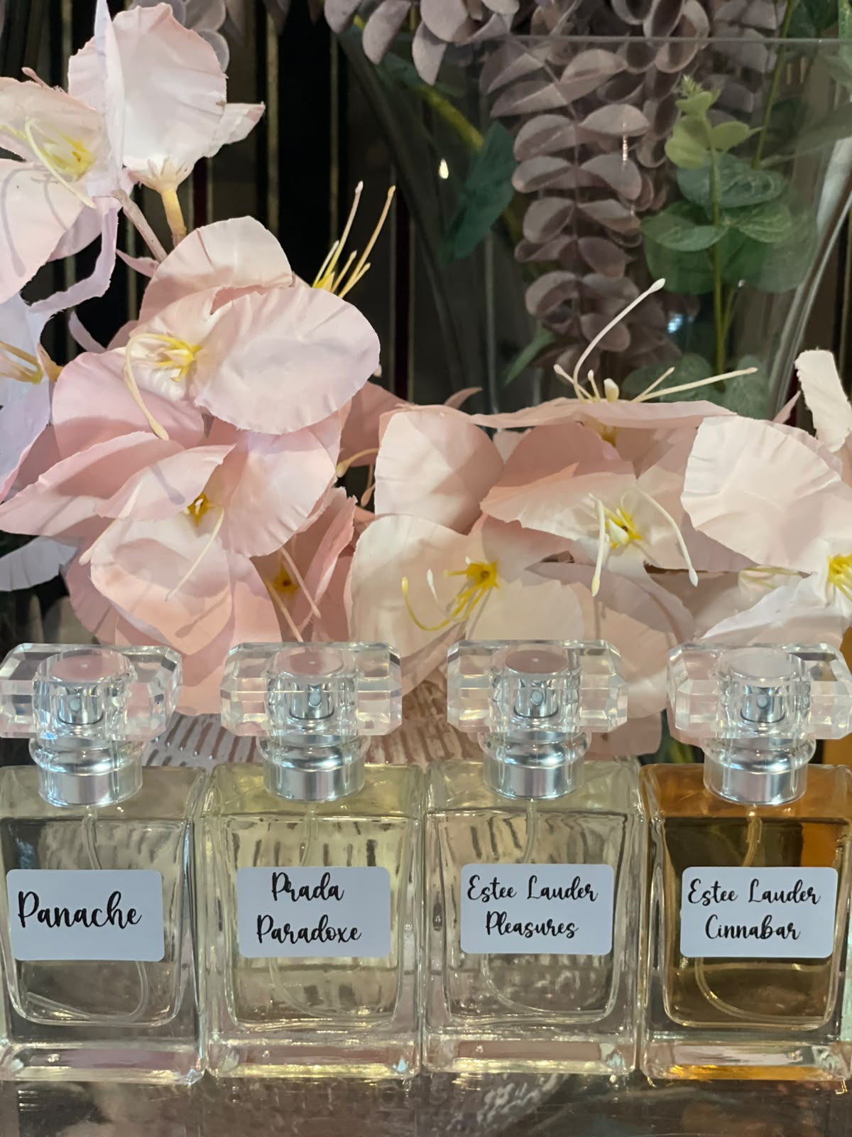 The Double Based Oil range lined up in diamond-glass bottles